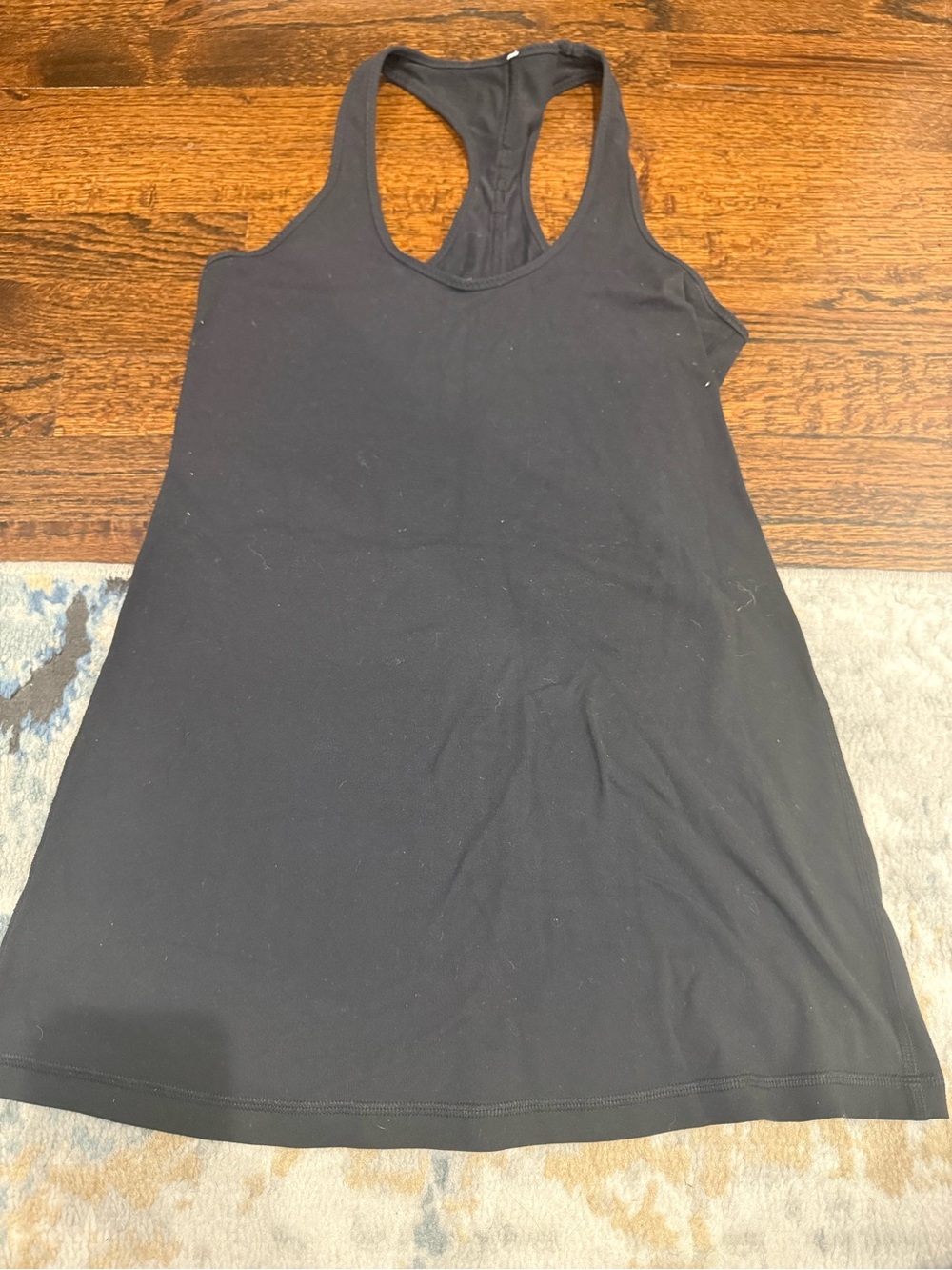 Lululemon racer back tank in black with velvet on back estimated size 6